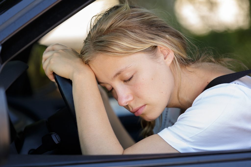 tired woman sleep in car tired woman sleep in car